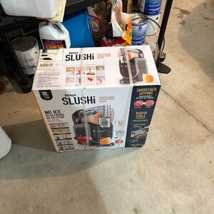 Ninja Slushie Machine with Black and Orange Accents